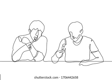 two men sit on one side of the table and eat informally with appetite. Each gourmet with an open mouth holds a fork with food. Vector one continuous line drawing of friends eating