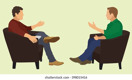 Two Men Sitting In Chairs Facing Each Other Having In Conversation