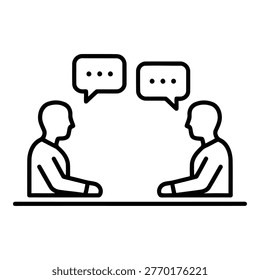 Two men sitting at table talking
