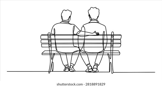 Two men sitting together