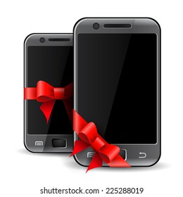 Two mobile phones with red gift ribbon