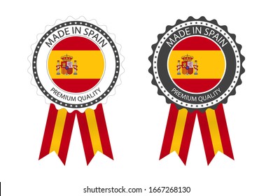 Two modern vector Made in Spain labels isolated on white background, simple stickers in Spanish colors, premium quality stamp design, flag of Spain