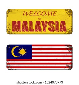 Two old grunge nameplates with Malaysia flag and welcome text