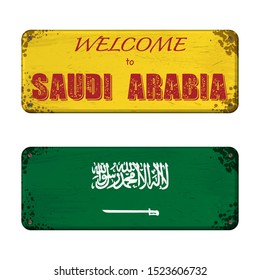 Two old grunge nameplates with Saudi Arabia flag and welcome text isolated on white background