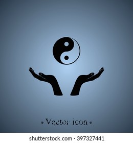 Two opened hands holding Yin Yang symbol.