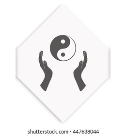 Two opened hands holding Yin Yang symbol.