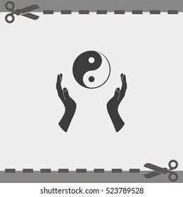 Two opened hands holding Yin Yang symbol.