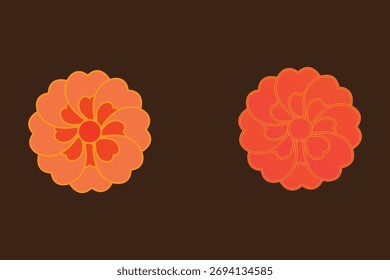 Two orange floral patterned cookies on a dark background