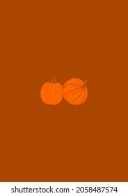 two orange pumpkins on a brown background