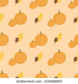two orange pumpkins and a yellow leaf of oak with two acorns. Autumn (fall) flat pattern