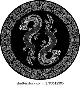 two outline dragons in black ornamented circle or plate