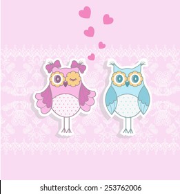 Two owls in love on a pink background with a pattern