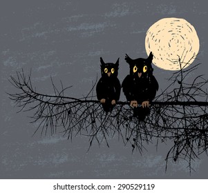 two owls in the night forest