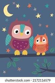 Two owls on the tree at night