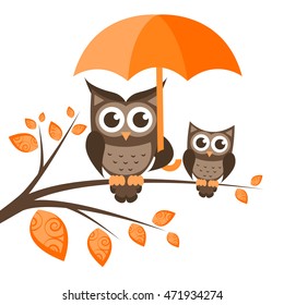 Two owls on the tree with umbrella