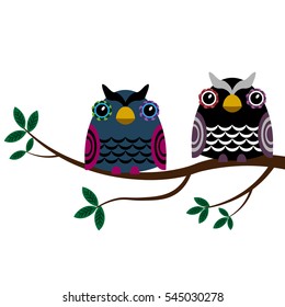 Two Owls sitting on the branch