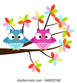 Two Owls sitting on the branch