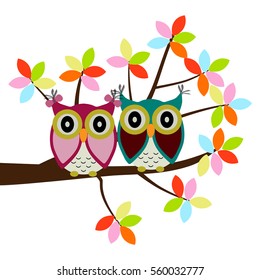 Two Owls sitting on the branch