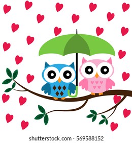 Two Owls sitting on the branch with green umbrella under the hearts rain