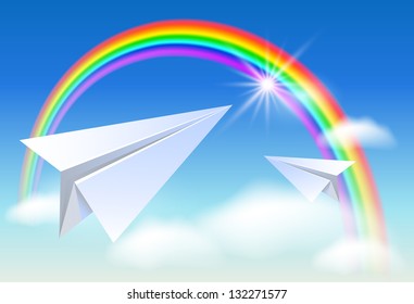 Two paper airplane flying to the rainbow