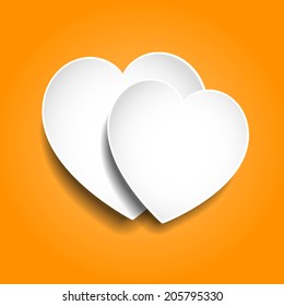 Dos corazones de papel con fondo naranja 3D