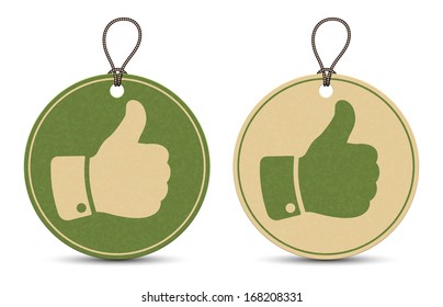 Two paper thumb up tags isolated on white background