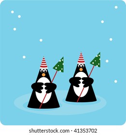 Two penguins in snow environment with christmas trees