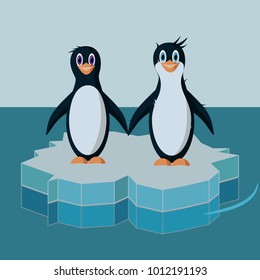 Two penguins standing on an ice floe