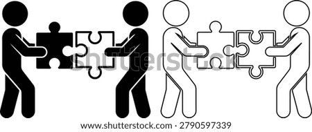 Two people combining puzzle pieces together