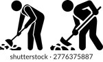 Two people digging soil with shovels in a garden