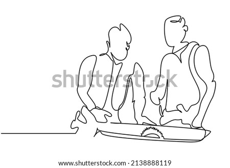 two people doing carpentry remodeling work together