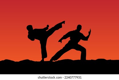 Two People Doing Martial Arts Sihouette Vector