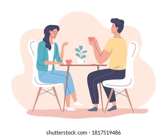 Two people drinking tea together at the table