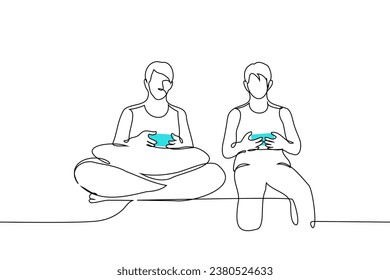 dos personas están sentadas lado a lado, joysticks en sus manos, están jugando video juegos - un vector de arte de una línea. pareja de conceptos o amigos jugando videojuegos