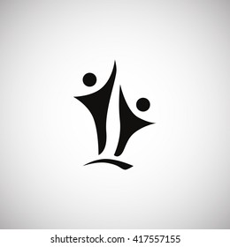 Two people silhouettes reaching up logo