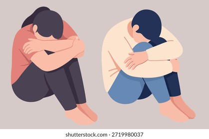 Duas pessoas sentam-se encolhidas, com a cabeça para baixo, parecendo tristes ou angustiadas.