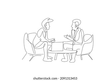 Two People Sitting Opposite Each Other Talking. Business World Two People At The Meeting