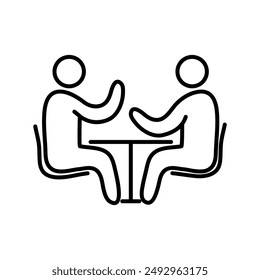 Two People Sitting at a Table