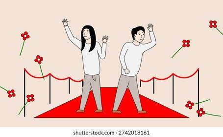 Two people are standing on a red carpet, waving to the camera. The background features a bunch of red flowers scattered around