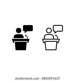 Two people standing at podiums speaking