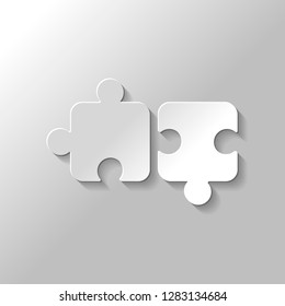 Two pieces of puzzle, creative teamwork, different solutions, logic game, simple icon. Paper style with shadow on gray background