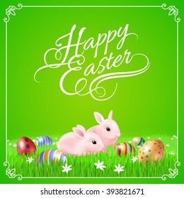 Two Pink Easter Bunny and Easter Eggs in Green Grass