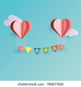 Two pink heart balloons floating in the sky with a love letter banner stretched between each other..Happy valentine's day background.