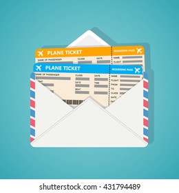 Two plane tickets in corporate envelop on blue background.