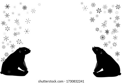 Two polar bears sitting facing each other