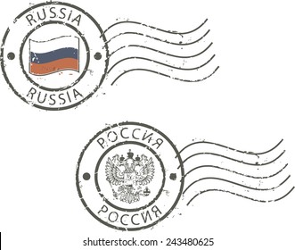 Two postal grunge stamps 'Russia' with the flag and two-headed eagle. Latin and cyrillic inscription.