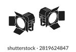 Two professional black studio spotlight fixtures with open barndoors designed for stage or movie set lighting.