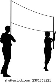 Two protestors or demonstrators at a demonstration march, picket line or strike protest rally in silhouette. Holding up a banner sign.