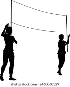 Two protestors or demonstrators at a demonstration march, picket line or strike protest rally in silhouette. Holding up a banner sign.