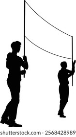 Two protestors or demonstrators at a demonstration march, picket line or strike protest rally in silhouette. Holding up a banner sign.